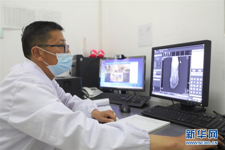 （圖文互動）（3）隔屏看專家 “醫共體”緩解看病難